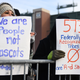 Protesters denounce the racist name of the NFL’s Washington team.